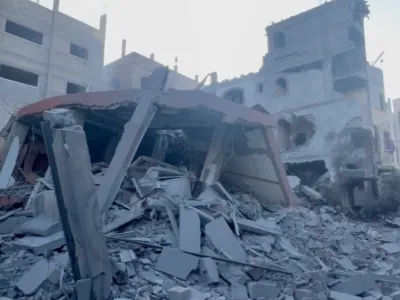 Rubble and a damaged building are seen in the aftermath of an Israeli strike in Jabalia, in the northern Gaza Strip, October 12, 2023 in this still image obtained from social media video. Ibrahim Nofal via REUTERS MANDATORY CREDIT. NO RESALES. NO ARCHIVES. THIS IMAGE HAS BEEN SUPPLIED BY A THIRD PARTY.