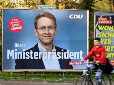 An election poster for the upcoming state elections on May 8 shows Schleswig Holstein's Prime Minister and Christian Democratic (CDU) top candidate Daniel Guenther in Elmshorn, Germany, May 3, 2022. REUTERS/Fabian Bimmer