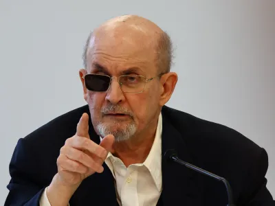 Author Salman Rushdie gestures during a news conference at the Book Fair in Frankfurt, Germany, October 20, 2023.   REUTERS/Kai Pfaffenbach