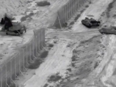 Israeli armoured vehicles take part in an operation, as the conflict between Israel and Hamas continues, at a location given as the northern Gaza Strip in this still image taken from handout video released October 26, 2023.   Israel Defense Forces/Handout via REUTERS  THIS IMAGE HAS BEEN SUPPLIED BY A THIRD PARTY   TPX IMAGES OF THE DAY