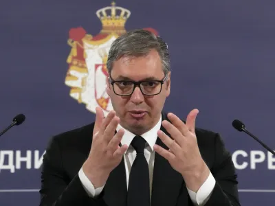 Serbian President Aleksandar Vucic addresses media after shooting in Ribnikar school in Belgrade, Serbia, Wednesday, May 3, 2023. Police say a 13-year-old who opened fire at his school drew sketches of classrooms and made a list of people he intended to target. He killed eight fellow students and a school guard before being arrested Wednesday. (AP Photo/Darko Vojinovic)