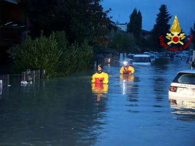 FILE PHOTO: Italian firefighters work in flooded streets in the Tuscany region, Italy, November 3, 2023. Several people died and went missing in the central region of Tuscany as Storm Ciaran battered western Europe. Vigili del Fuoco/Handout via REUTERS ATTENTION EDITORS THIS IMAGE HAS BEEN SUPPLIED BY A THIRD PARTY. DO NOT OBSCURE LOGO./File Photo