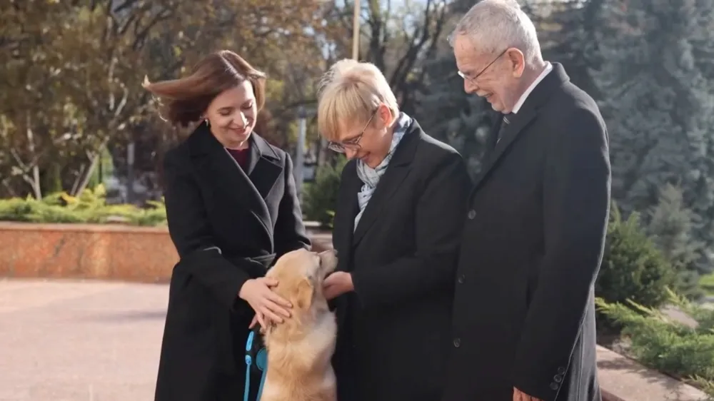 Moldova's President Maia Sandu and her dog greet Austria's President Alexander Van der Bellen and Slovenia's President Natasa Pirc Musar in Chisinau, Moldova November 16, 2023, in this handout picture. Maia Sandu via Facebook/Handout via REUTERS THIS IMAGE HAS BEEN SUPPLIED BY A THIRD PARTY. MANDATORY CREDIT. NO RESALES. NO ARCHIVES.