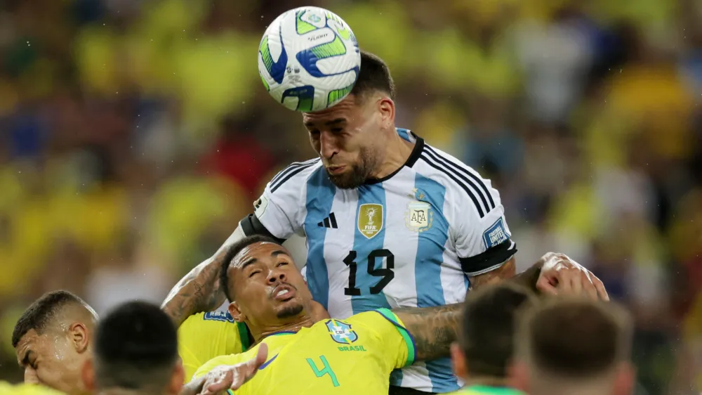 Soccer Football - World Cup - South American Qualifiers - Brazil v Argentina - Estadio Maracana, Rio de Janeiro, Brazil - November 21, 2023 Argentina's Nicolas Otamendi scores their first goal REUTERS/Ricardo Moraes