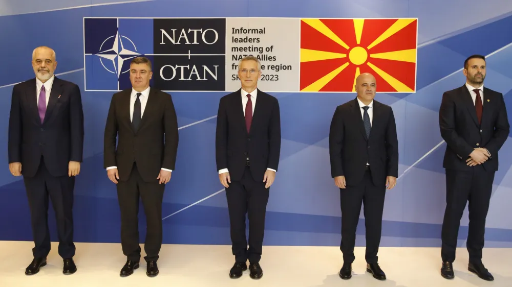 From left, Albania's Prime Minister Edi Rama, Croatia's President Zoran Milanovic, NATO Secretary General Jens Stoltenberg, North Macedonia's Prime Minister Dimitar Kovacevski and Montenegro's Prime Minister Milojko Spajic, stand for a family photo after their meeting, in Skopje, North Macedonia, on Wednesday, Nov. 22, 2023. (AP Photo/Boris Grdanoski)