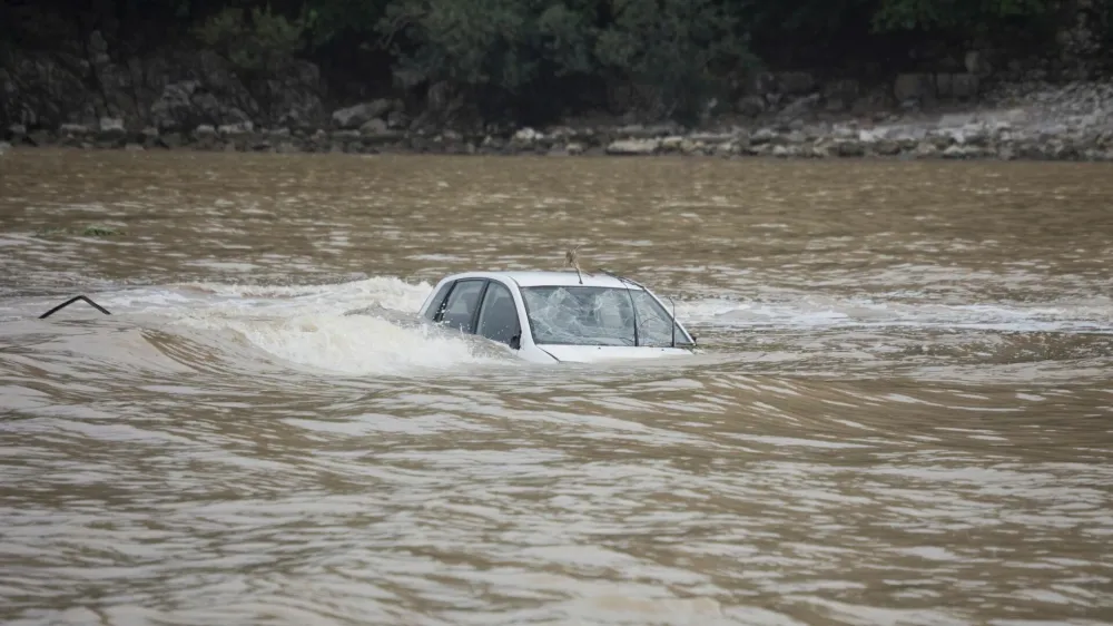 Car flooded in the Ocean - Flood Disaster in Olympos, Turkey, Asia