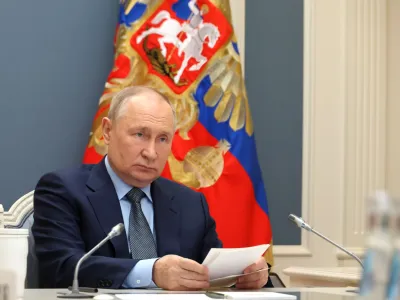 HANDOUT - 22 November 2023, Russia, Novo-Ogarevo: Russian President Vladimir Putin takes part in the extraordinary G20 summit via videoconference. Photo: -/Kremlin/dpa - ATTENTION: editorial use only and only if the credit mentioned above is referenced in full