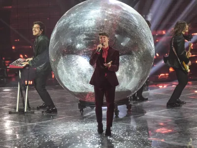 LPS from Slovenia singing Disko performs during the first semi final at the Eurovision Song Contest in Turin, Italy, Tuesday, May 10, 2022. (AP Photo/Luca Bruno)