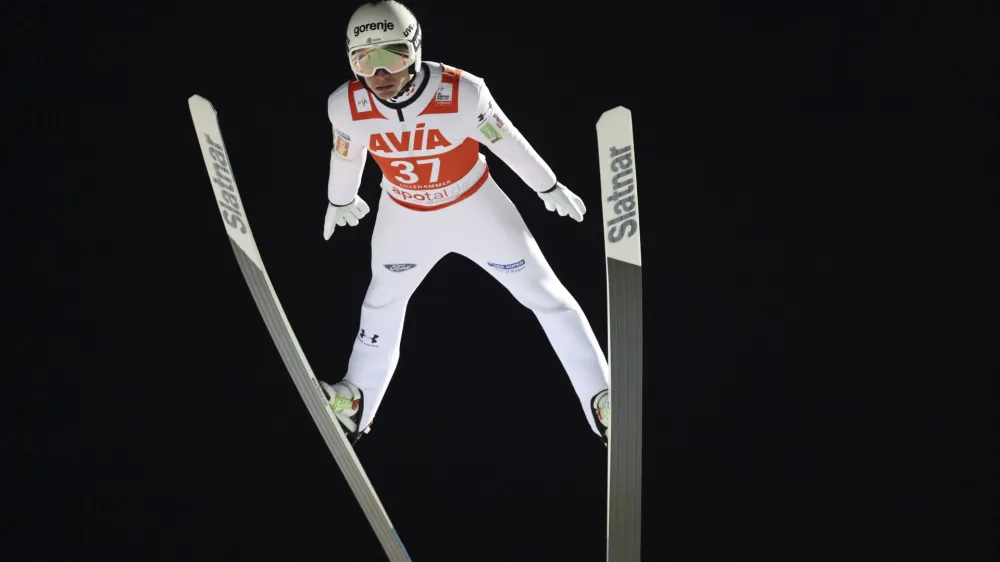 Anze Lanisek from Slovenia soars through the air in the World Cup for men, in Lillehammer, Norway, Saturday, Dec. 2, 2023. (Geir Olsen/NTB Scanpix via AP)