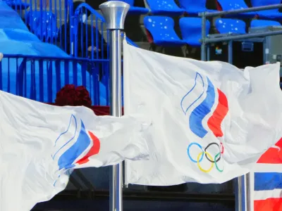 FILED - 20 February 2022, China, Beijing: The flag of the Russian Olympic Committee flies in the stadium. Individual Russian and Belarusian athletes will be allowed to take part in the 2024 Olympic Games in Paris as neutral athletes, the International Olympic Committee has ruled. Photo: Michael Kappeler/dpa