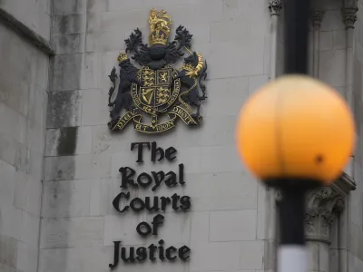 A general view of the Royal Courts of Justice where Justice Timothy Fancourt gave his ruling in the Prince Harry phone hacking lawsuit in London, Friday, Dec. 15, 2023. Prince Harry has won his phone hacking lawsuit against the publisher of the Daily Mirror and was awarded over 140,000 pounds (0,000) in the first of his several lawsuits against the tabloids to go to trial. Fancourt found on Friday that phone hacking was "widespread and habitual" at Mirror Group Newspapers over many years. (AP Photo/Kin Cheung)