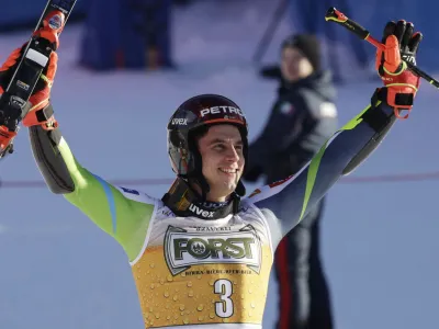 Alpine Skiing - FIS Alpine Ski World Cup - Men's Giant Slalom - Alta Badia, Italy - December 17, 2023 Slovenia's Zan Kranjec celebrates after finishing third in the men's giant slalom REUTERS/Leonhard Foeger