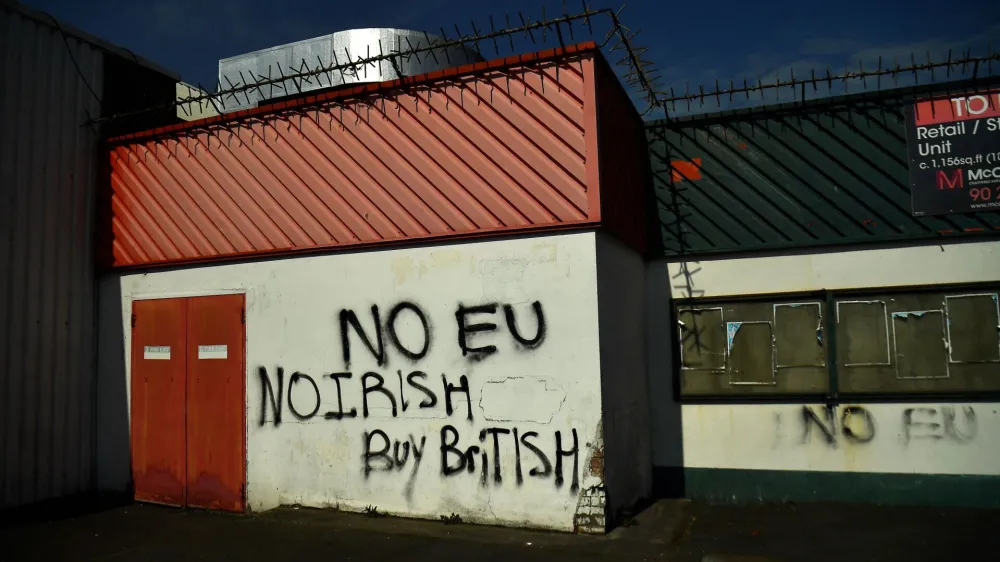 Graffiti reading 'no EU, no Irish, buy British' against the Northern Irish Protocol is seen in a Loyalist area of East Belfast, Northern Ireland, April 26, 2022. Picture taken April 26, 2022. REUTERS/Clodagh Kilcoyne