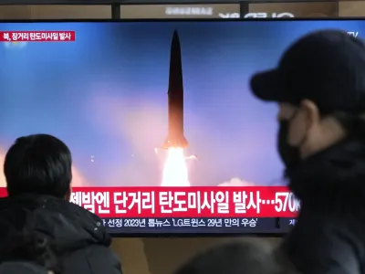 A TV screen shows a file image of North Korea's missile launch during a news program at the Seoul Railway Station in Seoul, South Korea, Monday, Dec. 18, 2023. North Korea fired an intercontinental ballistic missile into the sea Monday in a resumption of its high-profile weapons testing activities, its neighbors said, as the North vows strong responses against U.S. and South Korean moves to boost their nuclear deterrence plans. (AP Photo/Ahn Young-joon)