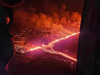 A volcano spews lava and smoke as it erupts near Grindavik, Iceland, December 19, 2023. Civil Protection of Iceland/Handout via REUTERS THIS IMAGE HAS BEEN SUPPLIED BY A THIRD PARTY. NO RESALES. NO ARCHIVES. MANDATORY CREDIT