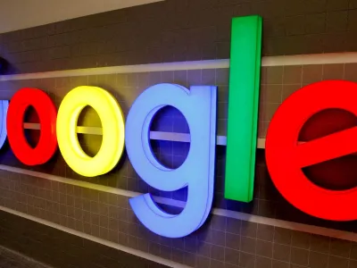 FILE PHOTO: FILE PHOTO: An illuminated Google logo is seen inside an office building in Zurich, Switzerland December 5, 2018.  REUTERS/Arnd Wiegmann/File Photo/File Photo