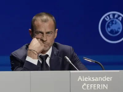 FILE - President of UEFA Aleksander Ceferin listens to questions during a news conference, after being reelected, at the end of the 47th ordinary UEFA congress in Lisbon, Wednesday, April 5, 2023. The European Union's top court has ruled UEFA and FIFA acted contrary to competition law by blocking plans for the breakaway Super League. The case was heard last year at the Court of Justice after Super League failed at launch in April 2021. UEFA President Aleksander Ceferin called the club leaders "snakes" and "liars." (AP Photo/Armando Franca, File)