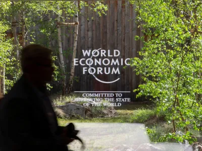 The logo of the upcoming World Economic Forum 2022 (WEF) is pictured on a window at the congress center, in the Alpine resort of Davos, Switzerland May 21, 2022. REUTERS/Arnd Wiegmann