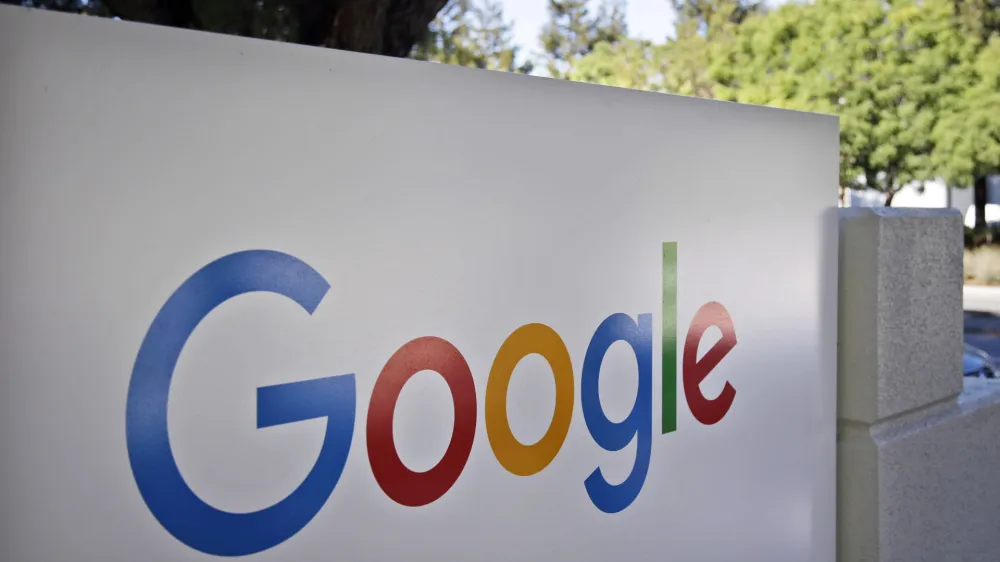 This Oct. 20, 2015 photo shows the Google logo outside the company's headquarters in Mountain View, Calif. Alphabet Inc., parent company of Google, reports quarterly financial results Thursday, Oct. 22, 2015. (AP Photo/Marcio Jose Sanchez, FIle)