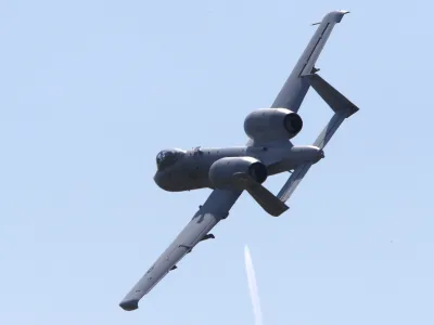 A U.S. A-10 Thunderbolt II aircraft flies over during the Swift Response 22 military exercise at the Krivolak army training polygon in the central part of North Macedonia, on Thursday, May 12, 2022. Hundreds of NATO soldiers have presented on Thursday airborne operations followed by parachuting, helicopters and ground activities to the top country's officials and diplomats, as allied airborne forces exercise "Swift Response 22" has entered in its final phase at the military polygon "Krivolak" in North Macedonia. The exercise, that includes about 4,600 soldiers from Albania, France, Greece, Italy, North Macedonia, Montenegro, the UK, and the U.S., was to demonstrate the NATO states' ability to deploy anywhere around the world and that it's soldiers can operate together professionally and successfully. (AP Photo/Boris Grdanoski)