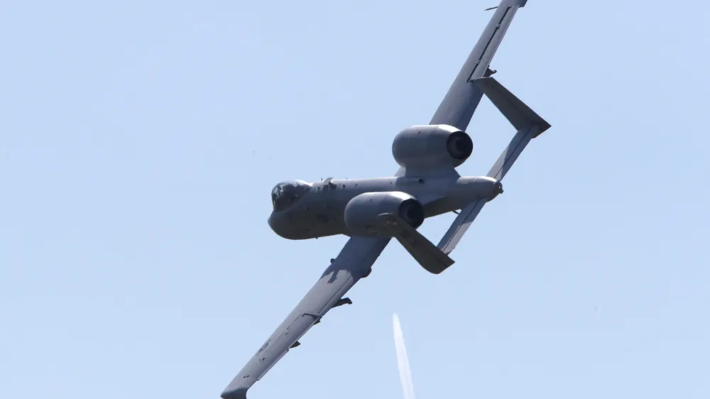 A U.S. A-10 Thunderbolt II aircraft flies over during the Swift Response 22 military exercise at the Krivolak army training polygon in the central part of North Macedonia, on Thursday, May 12, 2022. Hundreds of NATO soldiers have presented on Thursday airborne operations followed by parachuting, helicopters and ground activities to the top country's officials and diplomats, as allied airborne forces exercise "Swift Response 22" has entered in its final phase at the military polygon "Krivolak" in North Macedonia. The exercise, that includes about 4,600 soldiers from Albania, France, Greece, Italy, North Macedonia, Montenegro, the UK, and the U.S., was to demonstrate the NATO states' ability to deploy anywhere around the world and that it's soldiers can operate together professionally and successfully. (AP Photo/Boris Grdanoski)