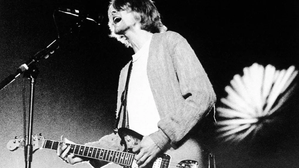 Kurt Cobain, front man of the rock group Nirvana, is shown during a benefit concert at the Cow Palace in Daly City, Calif., April 9, 1993. (AP Photo/Sam Morris)