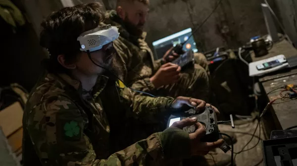 A Ukrainian serviceman of the attack drones battalion of the Achilles, 92nd brigade, operates a drone at his front line position, amid Russia's attack on Ukraine, near a Russian border in a Kharkiv region, Ukraine May 15, 2024. REUTERS/Inna Varenytsia