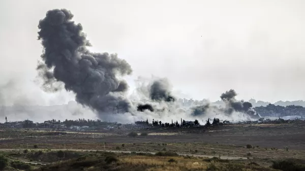 Smoke rises following an Israeli airstrike in the Gaza Strip, as seen from southern Israel, Friday, May 17, 2024. (AP Photo/Tsafrir Abayov)