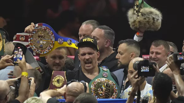 Ukraine's Oleksandr Usyk celebrates after beating Britain's Tyson Fury in their undisputed heavyweight world championship boxing fight at the Kingdom Arena in Riyadh, Saudi Arabia, Sunday, May 19, 2024. (AP Photo/Francisco Seco)