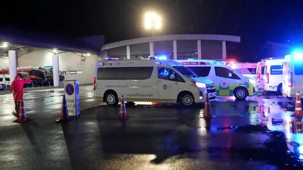 Ambulances wait to carry passengers from a London-Singapore flight that encountered severe turbulence, in Bangkok, Thailand, Tuesday, May 21, 2024. The plane apparently plummeted for a number of minutes before it was diverted to Bangkok, where emergency crews rushed to help injured passengers amid stormy weather, Singapore Airlines said Tuesday. (AP Photo/Sakchai Lalit)