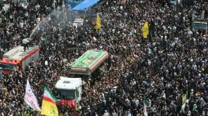 Mourners attend a funeral for victims of the helicopter crash that killed Iran's President Ebrahim Raisi, Foreign Minister Hossein Amirabdollahian and others, in Tehran, Iran, May 22, 2024. Majid Asgaripour/WANA (West Asia News Agency) via REUTERS ATTENTION EDITORS - THIS PICTURE WAS PROVIDED BY A THIRD PARTY