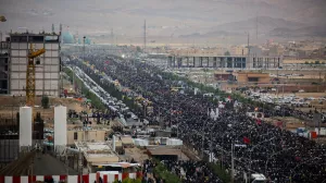 FILED - 21 May 2024, Iran, Qom: People attend a funeral procession for the late Iranian President Ebrahim Raisi, Foreign Minister Hossein Amirabdollahian and seven other passengers and crew who were killed in a helicopter crash on a fog-shrouded mountainside in the northwest. Photo: Ahmad Zohrabi/dpa