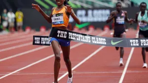 Beatrice Chebet of Kenya, sets a world record in the 10,000 with a time of 28:54.14, during the Prefontaine Classic track and field meet Saturday, May 25, 2024, in Eugene, Ore. (AP Photo/Thomas Boyd)