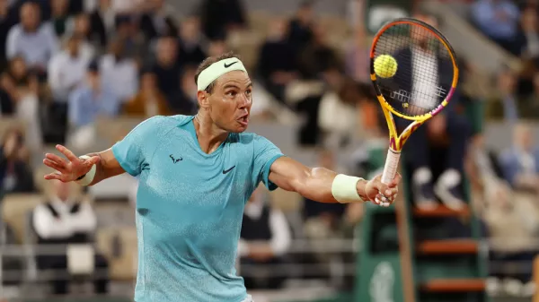 Spain's Rafael Nadal returns the ball against Germany's Alexander Zverev during their first round match of the French Open tennis tournament at the Roland Garros stadium in Paris, Monday, May 27, 2024. (AP Photo/Jean-Francois Badias)