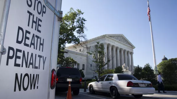 ﻿A vehicle parked near the Supreme Court in Washington, has signage that says "Stop The Death Penalty Now," Monday June 29, 2015. The Supreme Court is meeting for the final time until the fall to decide three remaining cases and add some new ones for the term that starts in October. The three remaining cases that are expected to be decided Monday raise important questions about a controversial drug that was implicated in botched executions, state efforts to reduce partisan influence in congressional redistricting and costly Environmental Protection Agency limits on the emission of mercury and other toxic pollutants from power plants. (AP Photo/Jacquelyn Martin)