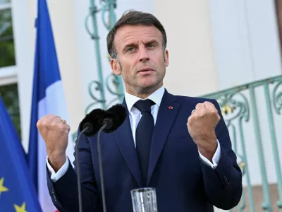 French President Emmanuel Macron gestures as he speaks to reporters on the day of a joint Franco-German cabinet meeting at the German government's guest house, Schloss Meseberg castle north of Berlin, in Gransee, Germany, May 28, 2024. REUTERS/Annegret Hilse