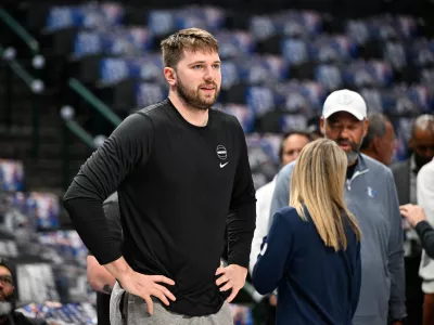 May 28, 2024; Dallas, Texas, USA; Dallas Mavericks guard Luka Doncic (77) warms up before game four against the Minnesota Timberwolves in the western conference finals for the 2024 NBA playoffs at American Airlines Center. Mandatory Credit: Jerome Miron-USA TODAY Sports