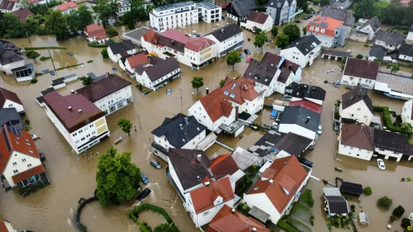 01 June 2024, Bavaria, Babenhausen: An aerial picture shows Babenhausen's streets flooded as a result of severe rains. Photo: Nikolas Schäfers/dpa