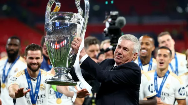 Soccer Football - Champions League - Final - Borussia Dortmund v Real Madrid - Wembley Stadium, London, Britain - June 1, 2024 Real Madrid coach Carlo Ancelotti celebrates with the trophy after winning the Champions League REUTERS/Hannah Mckay