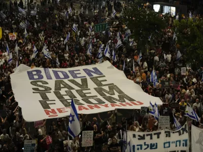 People protest against Israeli Prime Minister Benjamin Netanyahu's government and call for the release of hostages held in the Gaza Strip by the Hamas militant group in Tel Aviv, Israel, Saturday, June 1, 2024. (AP Photo/Maya Alleruzzo)