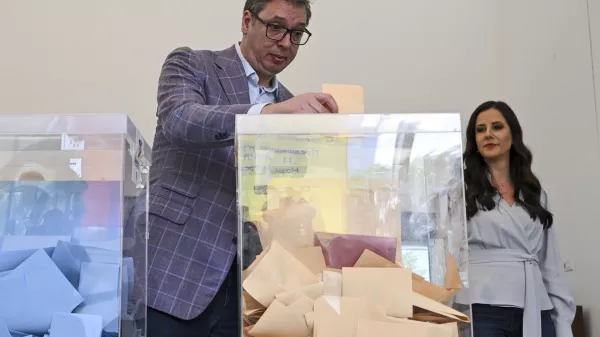 In this photo provided by the Serbian Presidential Press Service, Serbian President Aleksandar Vucic casts his ballot for a local election at a polling station in Belgrade, Serbia, Sunday, June 2, 2024. (Serbian Presidential Press Service via AP)