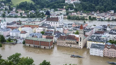 Parts of the Bavarian old town of Passau are flooded by the Danube, in Germany, Tuesday, June 4, 2024. Persistent heavy rain led to widespread flooding over the weekend in Bavaria which has left five people dead. (Armin Weigel/dpa via AP)