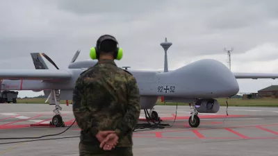 03 June 2024, Schleswig-Holstein, Jagel: A Bundeswehr Heron drone parks on the airfield of Tactical Air Force Wing 51 "Immelmann" during the NATO "Tiger Meet" air force training exercises "Tiger Meet". The international exercise in Jagel, features around 60 fighter jets and helicopters from 11 NATO countries, along with participants from Switzerland and Austria. Photo: Marcus Brandt/dpa