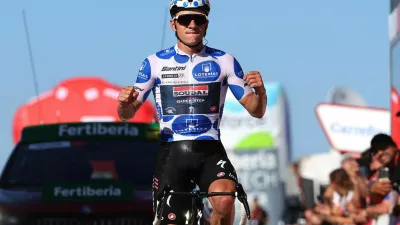 LA-CRUZ-DE-LINARES, SPAIN - SEPTEMBER 14: Remco Evenepoel of Belgium and Team Soudal - Quick Step - Polka dot Mountain Jersey celebrates at finish line as stage winner during the 78th Tour of Spain 2023, Stage 18 a 178.9km stage from Pola de Allande to La Cruz de Linares 840m / #UCIWT / on September 14, 2023 in La Cruz de Linares, Spain. (Photo by Alexander Hassenstein/Getty Images)