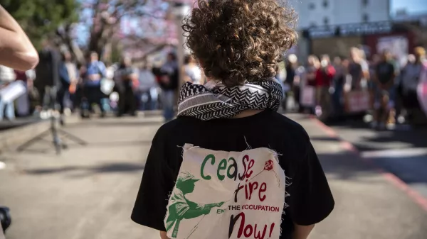 Hundreds of Portland, Ore., high school students and some of their teachers stream out of schools on Friday, March 15, 2024, to protest against the war in Gaza. The teacher's union in Portland has taken down some pro-Palestinian lesson plans from its website after pushback from some teachers and Jewish organizations who described the materials as one-sided and antisemitic. (Mark Graves/The Oregonian/The Oregonian via AP)