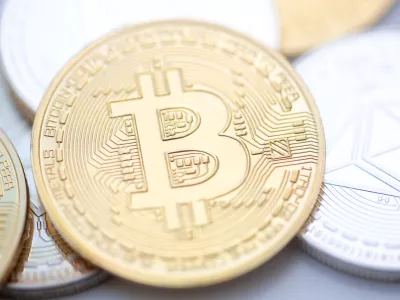 FILED - 10 November 2023, Berlin: Bitcoin (M) and Ethereum coins are arranged on a table. Photo: Fernando Gutierrez-Juarez/dpa