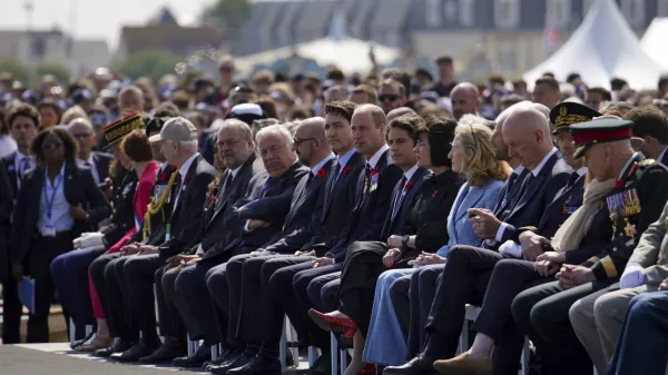 Canadian Prime Minister Justin Trudeau, Britain's Prince William, the Prince of Wales and Prime Minister of France Gabriel Attal sit, during the Government of Canada ceremony to mark the 80th anniversary of D-Day, at Juno Beach, in Courseulles-sur-Mer, Normandy, France, Thursday, June 6, 2024. (Jordan Pettitt, Pool Photo via AP)