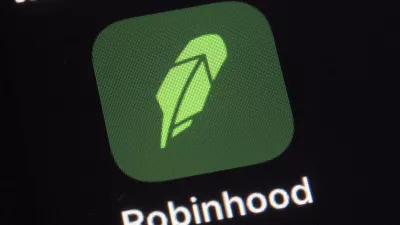 ﻿FILE - This Dec. 17, 2020, photo shows the logo for the Robinhood app on a smartphone in New York. Robinhood, the online brokerage that found itself embroiled in this year's meme stock phenomenon, will seek to go public with a market valuation of up to  billion. The company said in a regulatory filing on Monday, July 19, 2021, that it wanted to price the 55 million shares in its initial public offering in a range of  to  per share. It could raise approximately .3 billion if shares are sold at the high end of the range. (AP Photo/Patrick Sison, File)