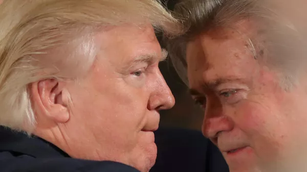 ﻿FILE PHOTO: U.S. President Donald Trump talks to chief strategist Steve Bannon during a swearing in ceremony for senior staff at the White House in Washington, U.S. January 22, 2017. REUTERS/Carlos Barria/File Photo