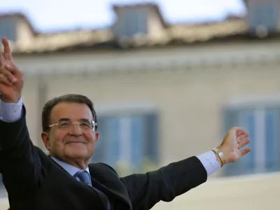 Italy's opposition leader Romano Prodi greets demonstrators gathered in Rome's Popolo square October 9, 2005. Prodi launched a withering attack against Prime Minister Silvio Berlusconi on Sunday, using a packed rally to effectively kick off his campaign to win the 2006 general election. Prodi accused Berlusconi of wrecking Italy's finances and international standing during his four years in office. REUTERS/Alessia Pierdomenico